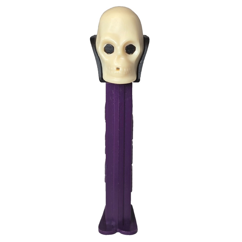 VINTAGE PEZ "DR. SKULL" RARE PURPLE DISPENSER WITH FEET COLLECTIBLE EUC